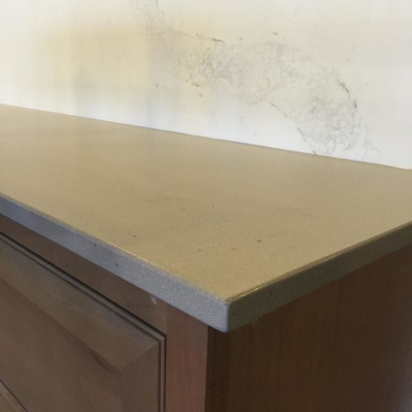 gray quartzite brown cabinets